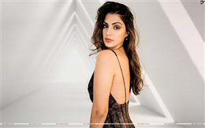 Rhea Chakraborty flaunts her sexy back